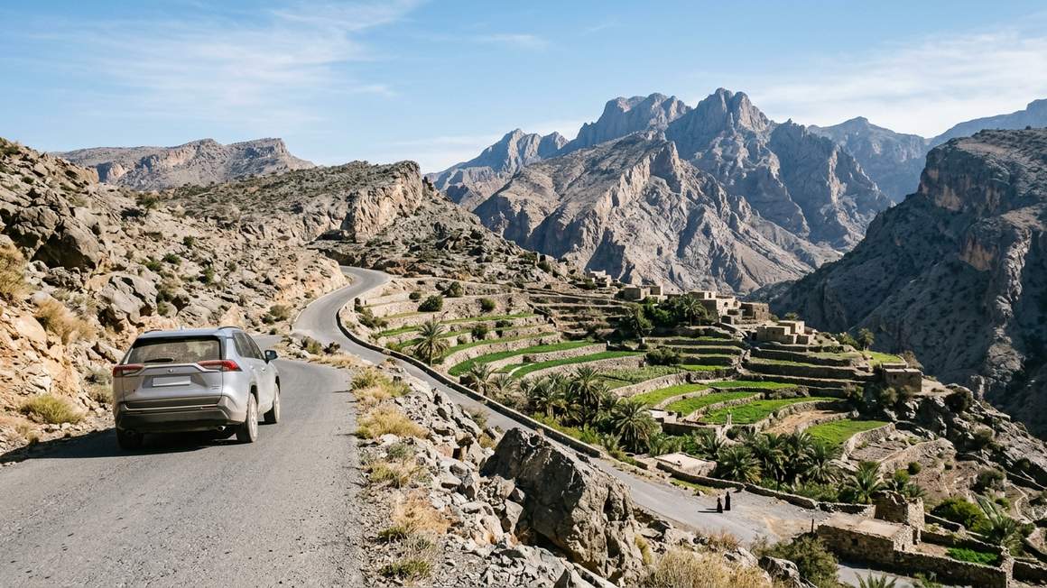 Mountain road through Jebel Akhdar with terraced farms in Oman